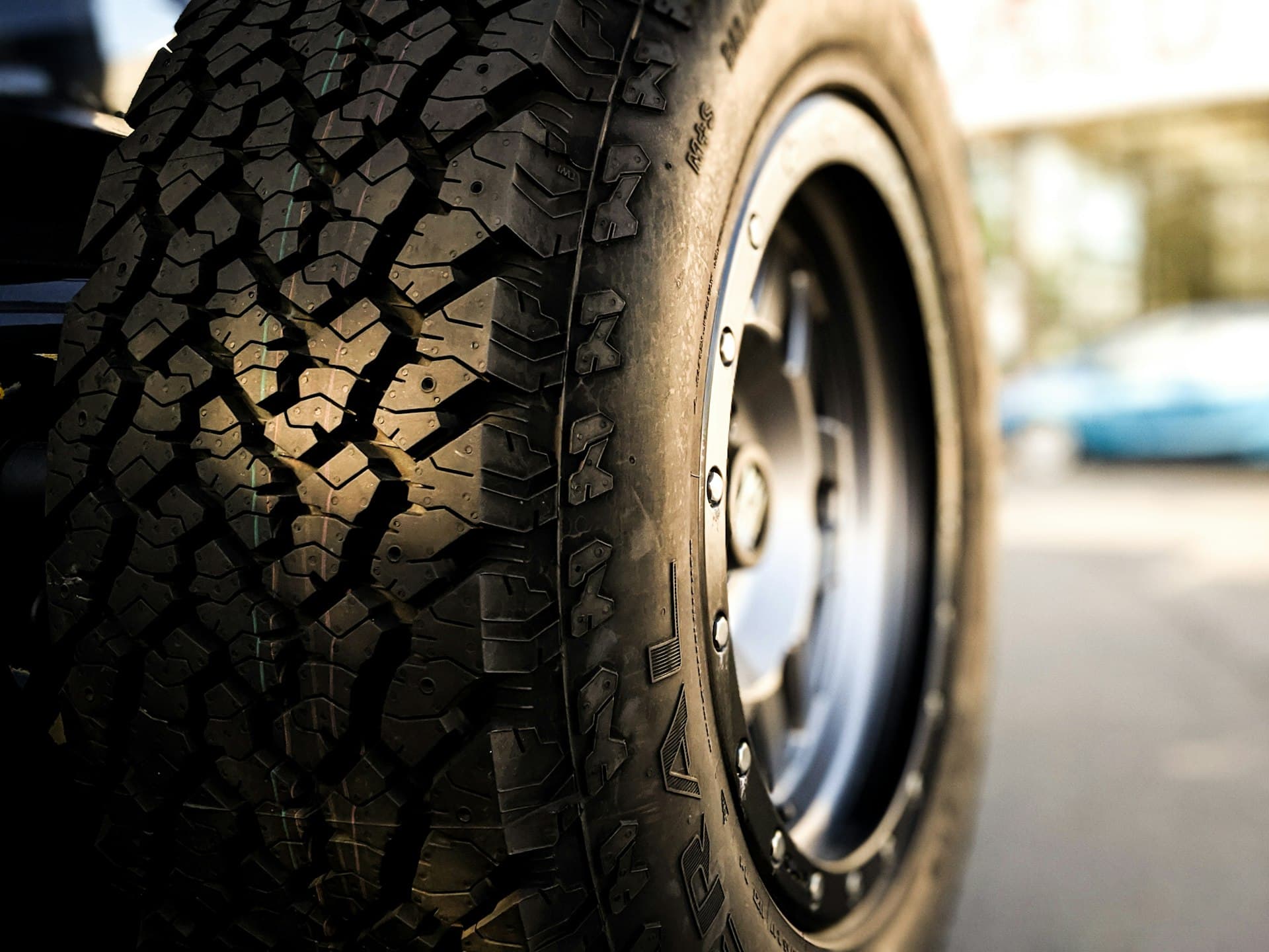 Car wheel on the road, mobile tyre fitting across Scotland